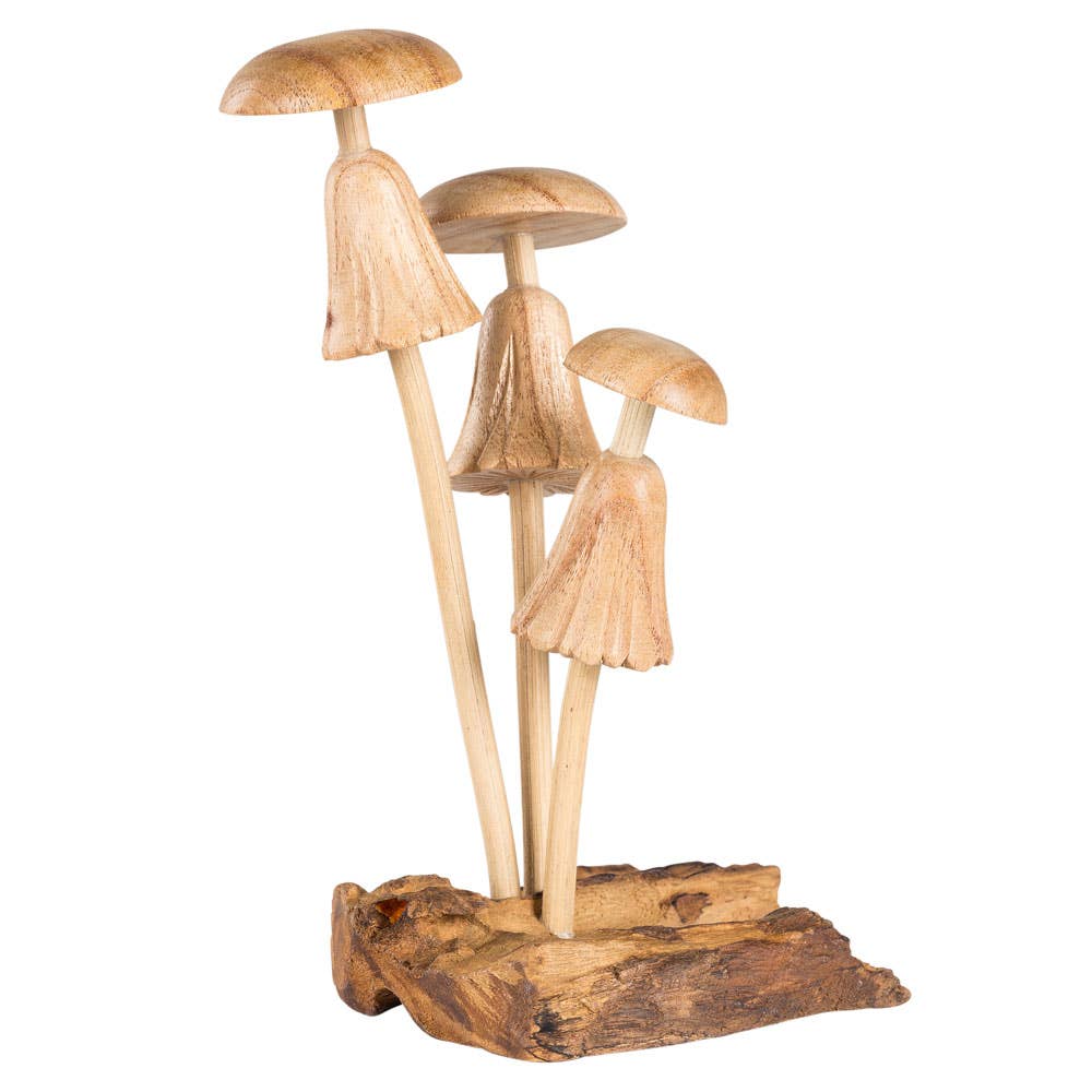 THREE CARVED DRIFTWOOD MUSHROOMS
